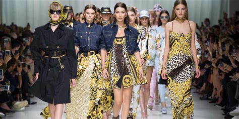 versace holdings acquisition